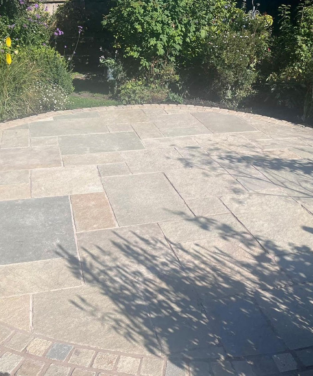 Blissford Tumbled Limestone Paving with Limestone Setts Lyndhurst