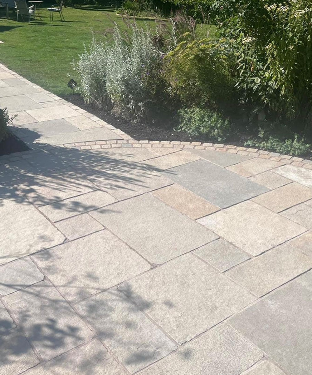 Blissford Tumbled Limestone Paving with Limestone Setts Lyndhurst