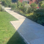 Blissford Tumbled Limestone Paving with Limestone Setts Lyndhurst