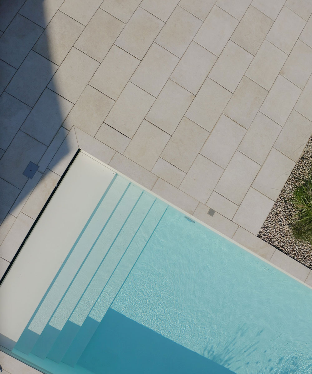 Kimmeridge-Fossil-Porcelain-Paving-Dorset-Swimming-Pool-Drone-Poole