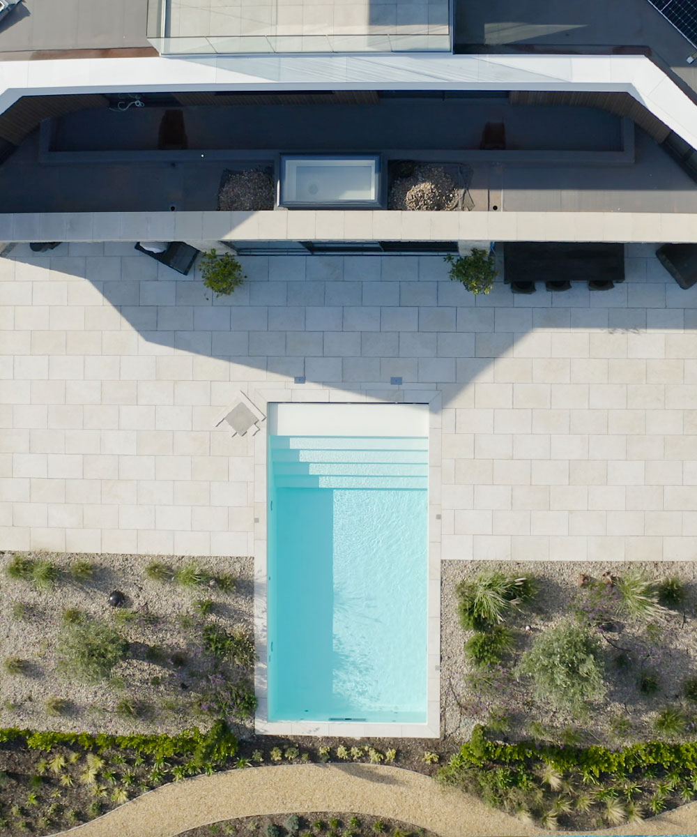 Kimmeridge-Fossil-Porcelain-Paving-Dorset-Swimming-Pool-Drone-Poole