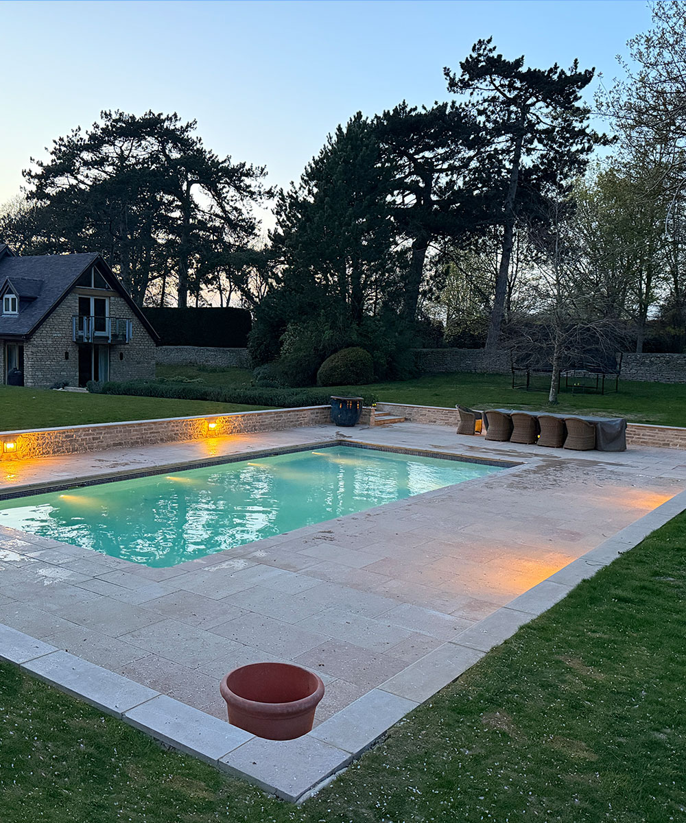 Lymington Dusk Egyptian Limestone Swimming Pool Buckinghamshire