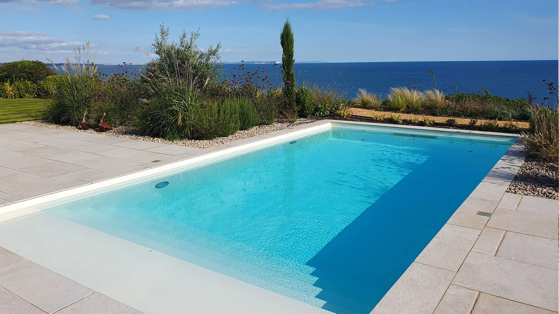 Kimmeridge Fossil porcelain paving and pool terrace on the Dorset coast