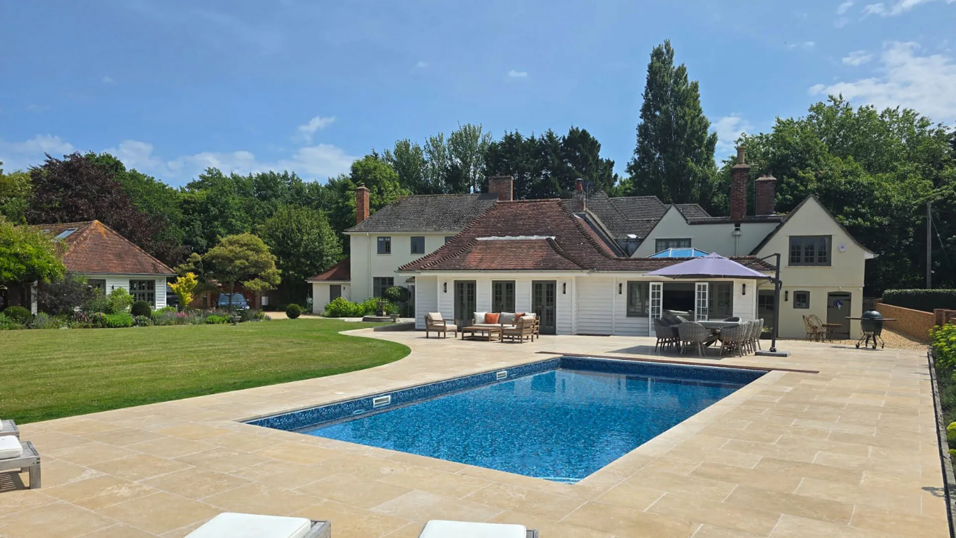 Lymington Beige limestone swimming pool surround in Lymington